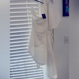 Plus size one shoulder white and gold polka dot blouse.